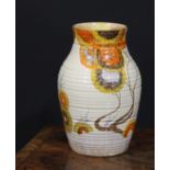 A Clarice Cliff Bizarre Rodanthe pattern lotus vase, of ribbed ovoid form, hand painted with