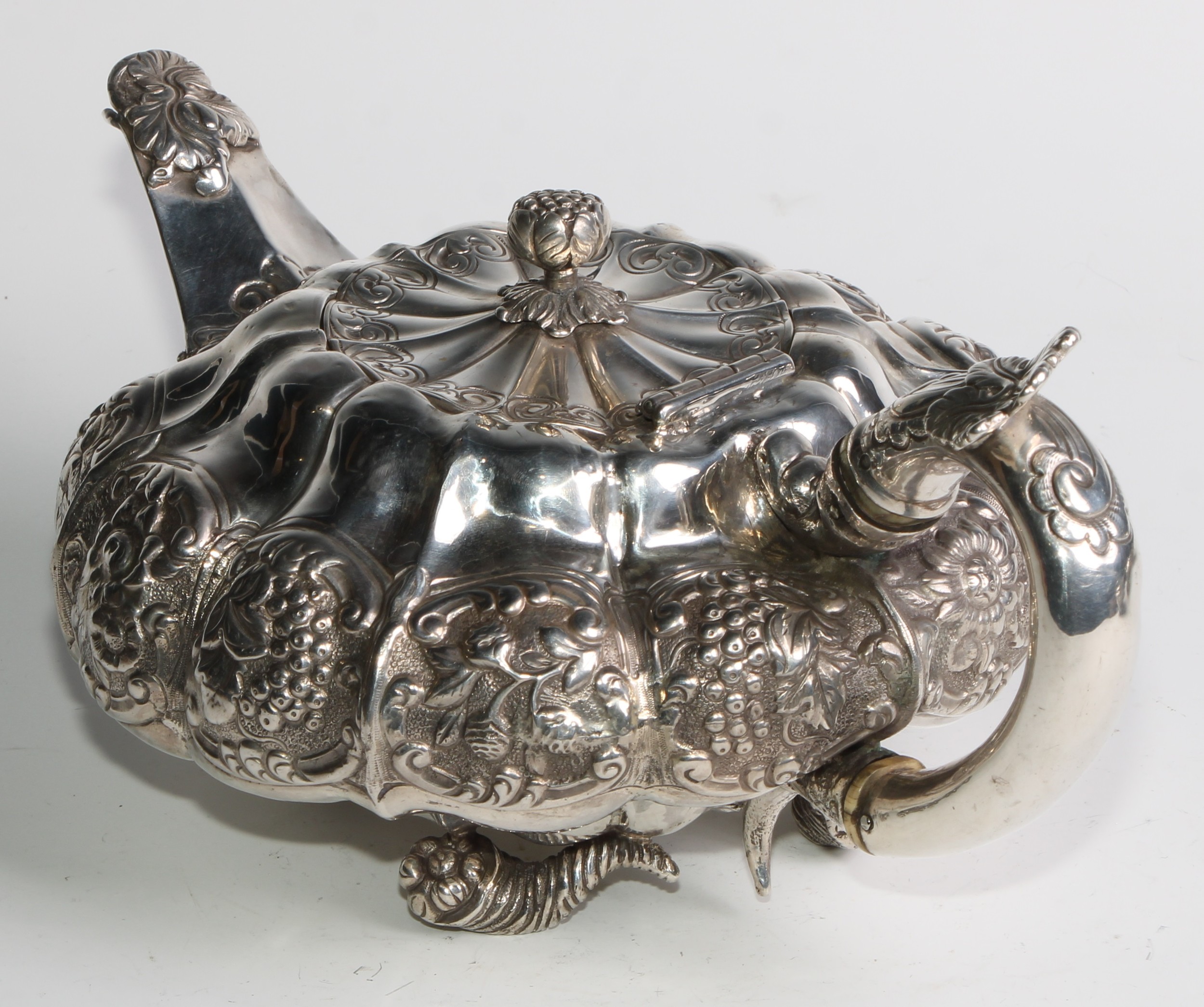 A George IV silver three piece melon shaped tea service, comprising teapot, milk jug and sugar - Image 6 of 14