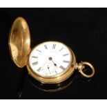 A Pateck full hunter pocket or fob watch, stamped '18K' for 18ct gold, white enamel dial, Roman