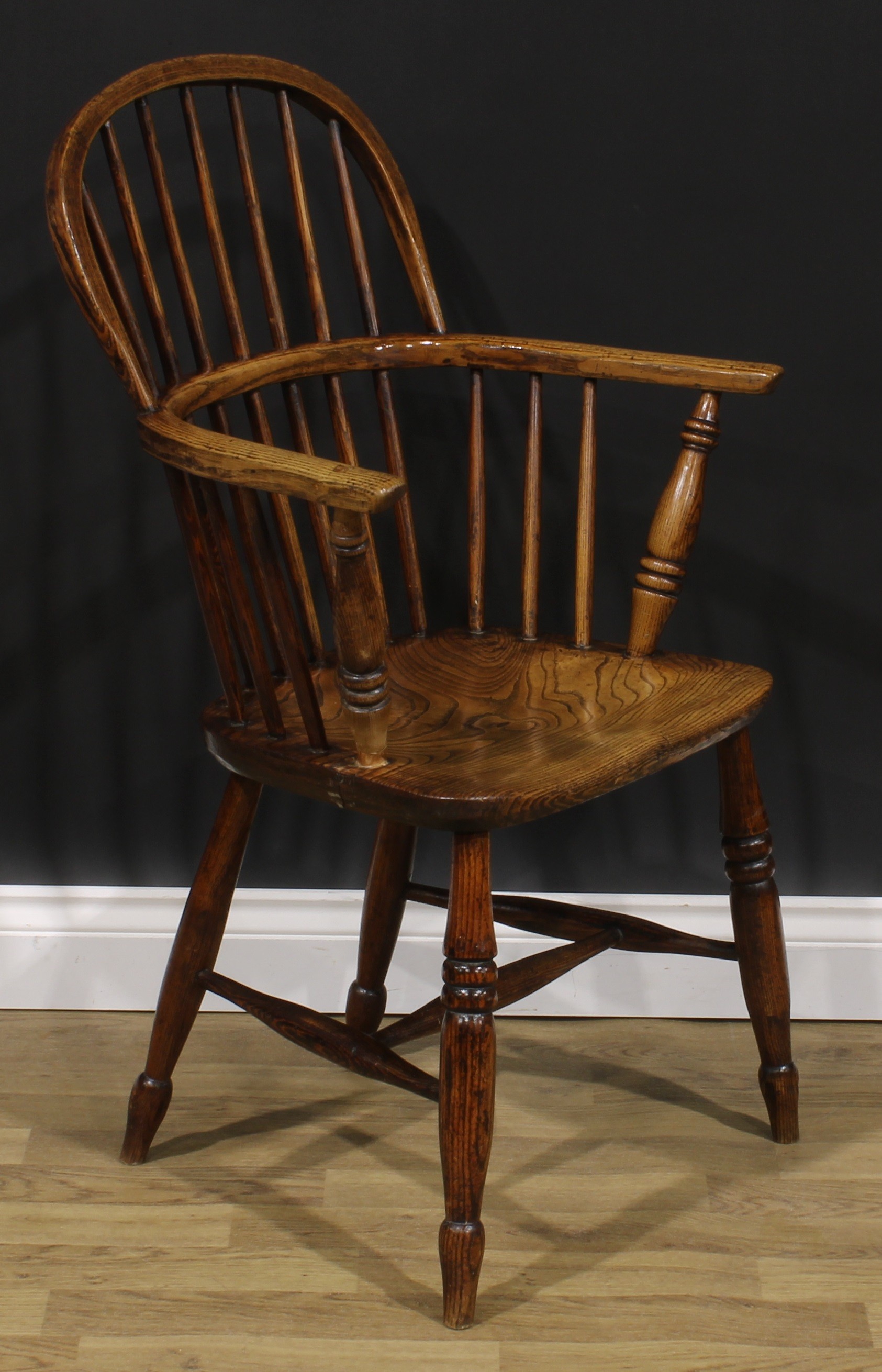 A 19th century ash and elm Windsor elbow chair, low hoop back, saddle seat, H-stretcher, 95cm - Image 2 of 4