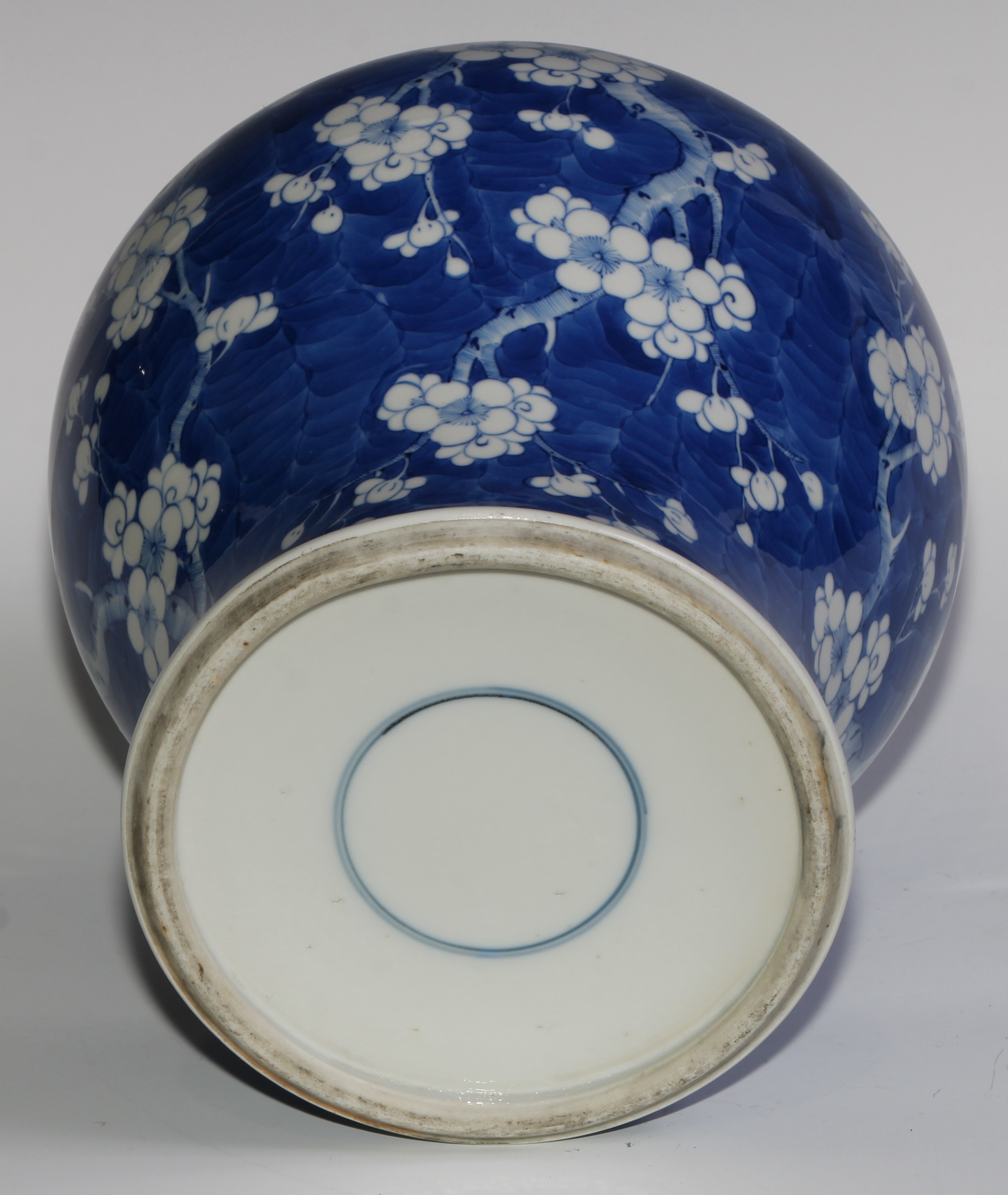 A Chinese baluster jar and cover, painted in tones of underglaze blue with blossoming prunus on a - Image 6 of 6