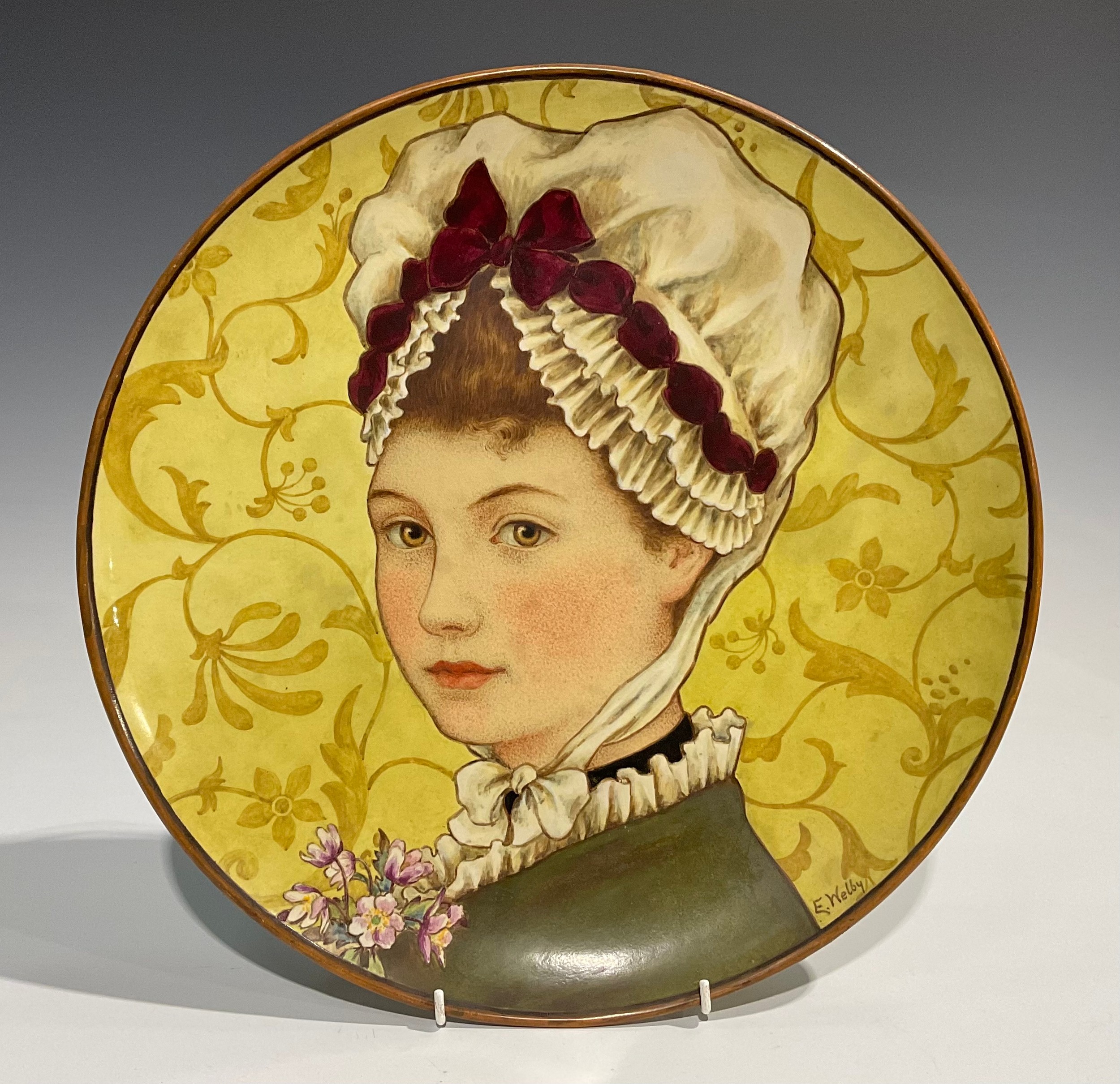 A Minton Aesthetic Movement circular charger, painted by E Welby, with a portrait of a Victorian - Image 2 of 5