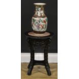 A Chinese hardwood jardiniere stand, circular top with beaded border and inset marble panel,