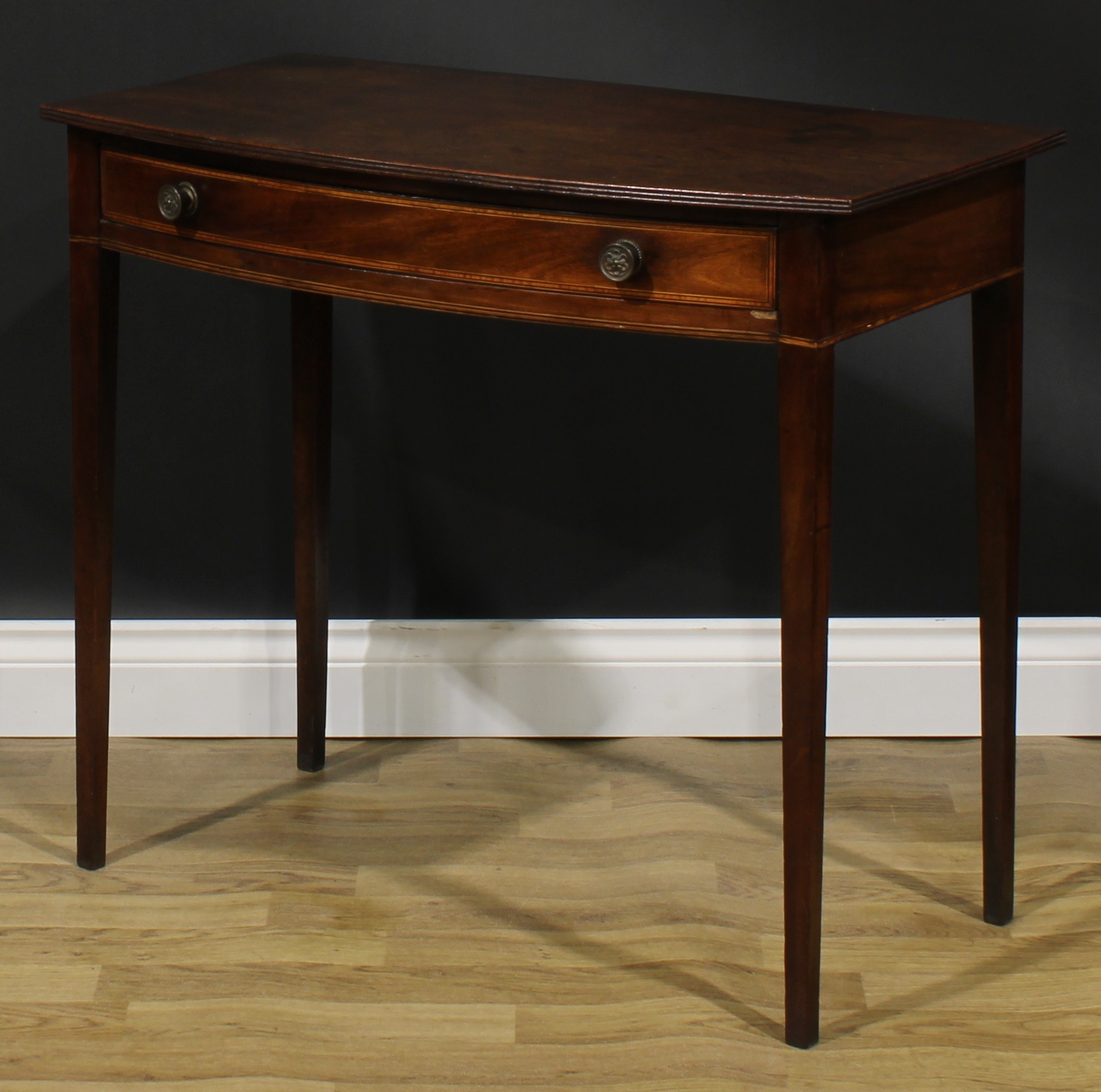 A George III mahogany bowfront side table, oversailing top with reeded edge above a long satinwood - Image 5 of 6