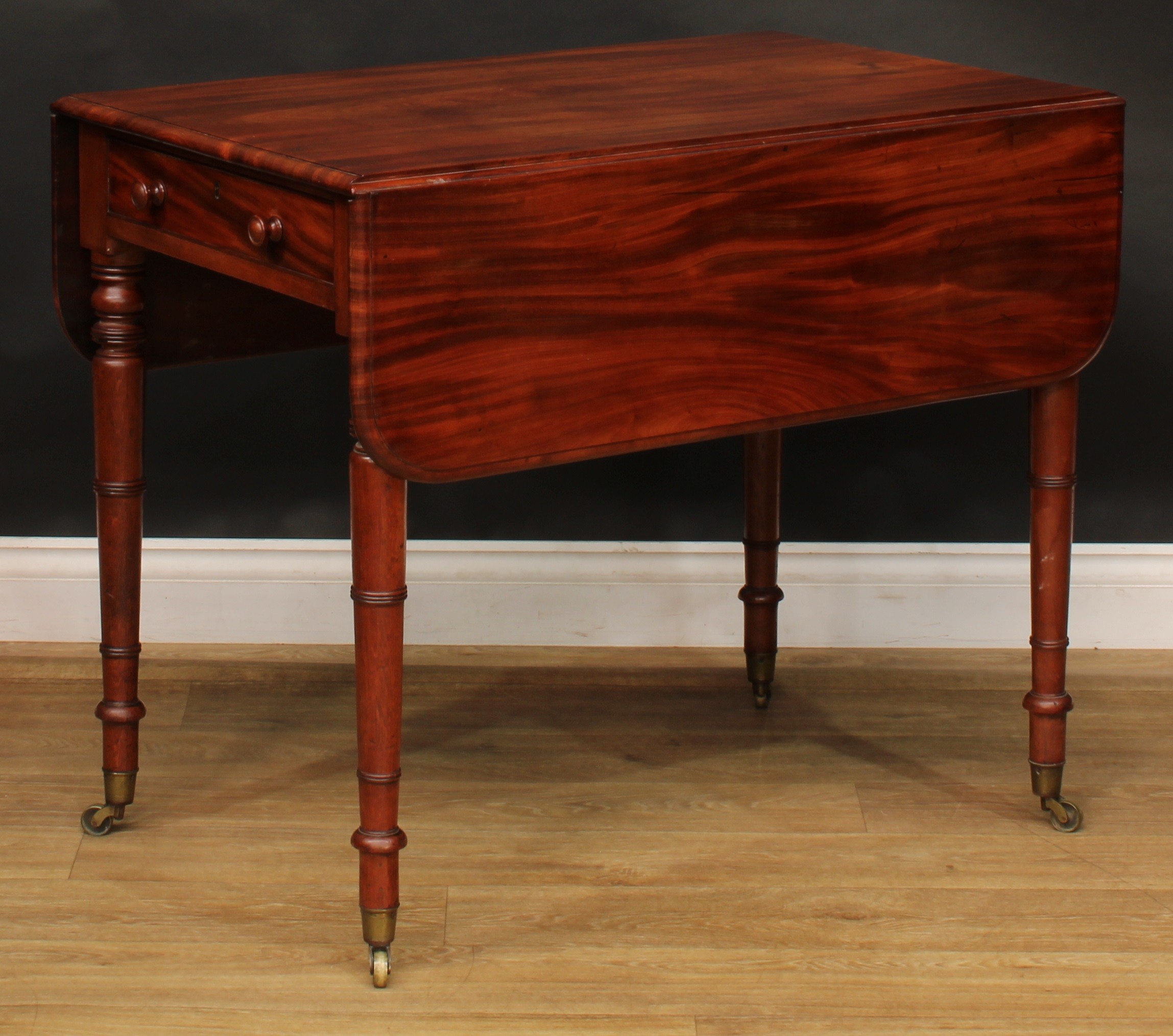 A George IV mahogany Pembroke table, rounded rectangular top with fall leaves above a single - Image 6 of 7
