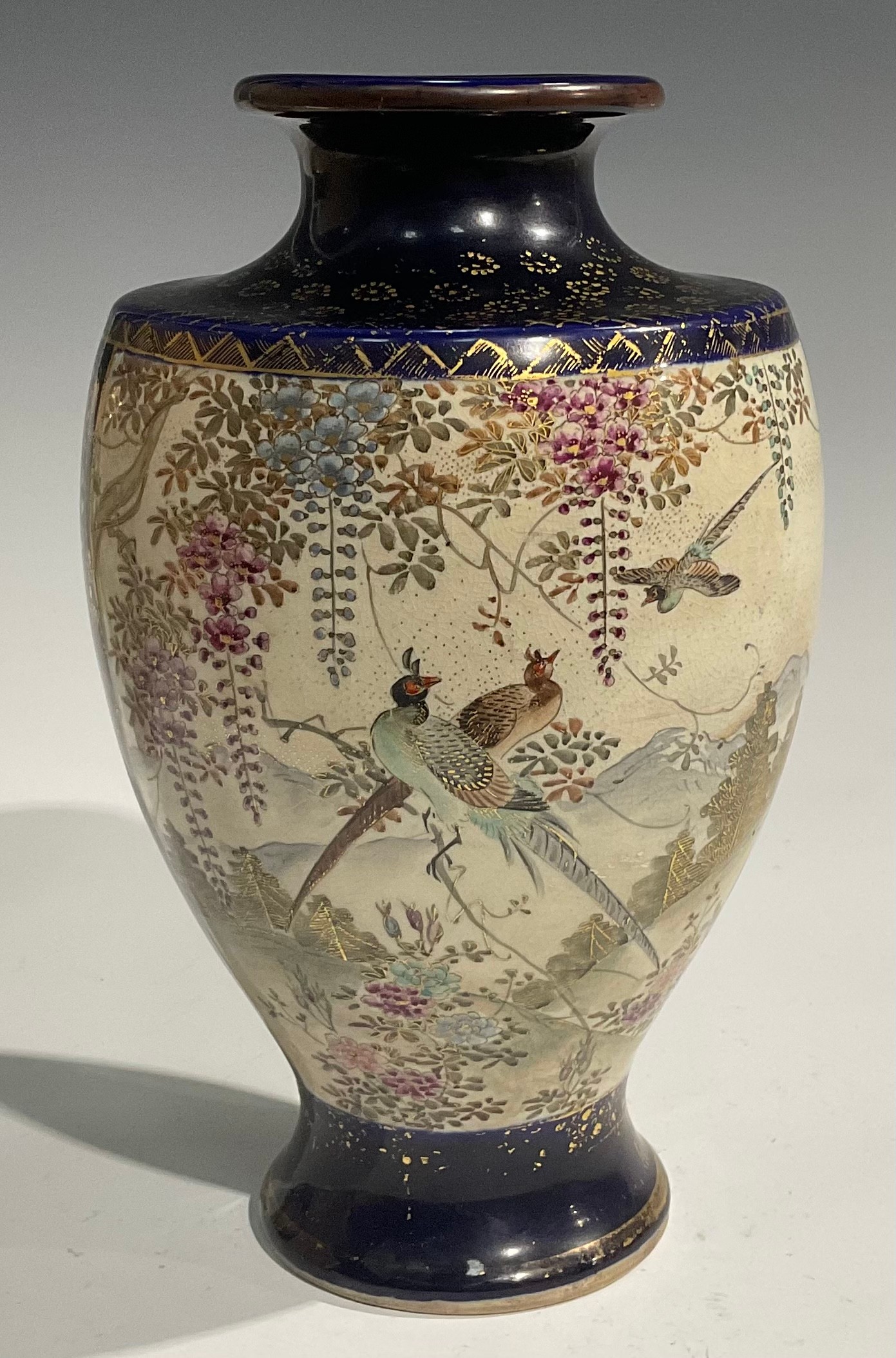 A pair of Japanese satsuma baluster vases, decorated with traditional landscape and bird panels, - Image 9 of 12