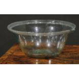 A George III aqua glass cream separator, folded rim, pontil mark, 32cm diameter x 13cm high