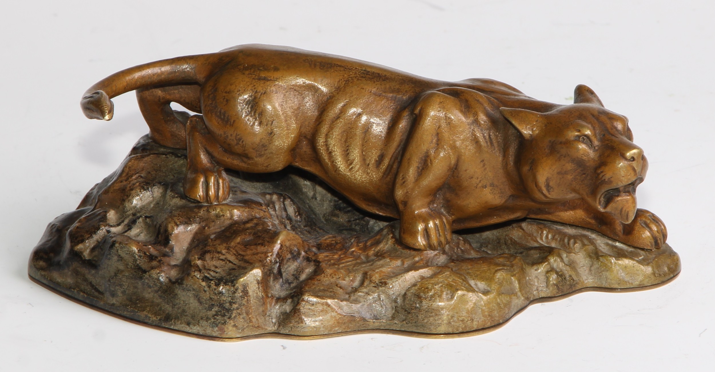 Continental School (early 20th century), a patinated bronze, of a mountain lion, stalking a rocky - Image 2 of 5