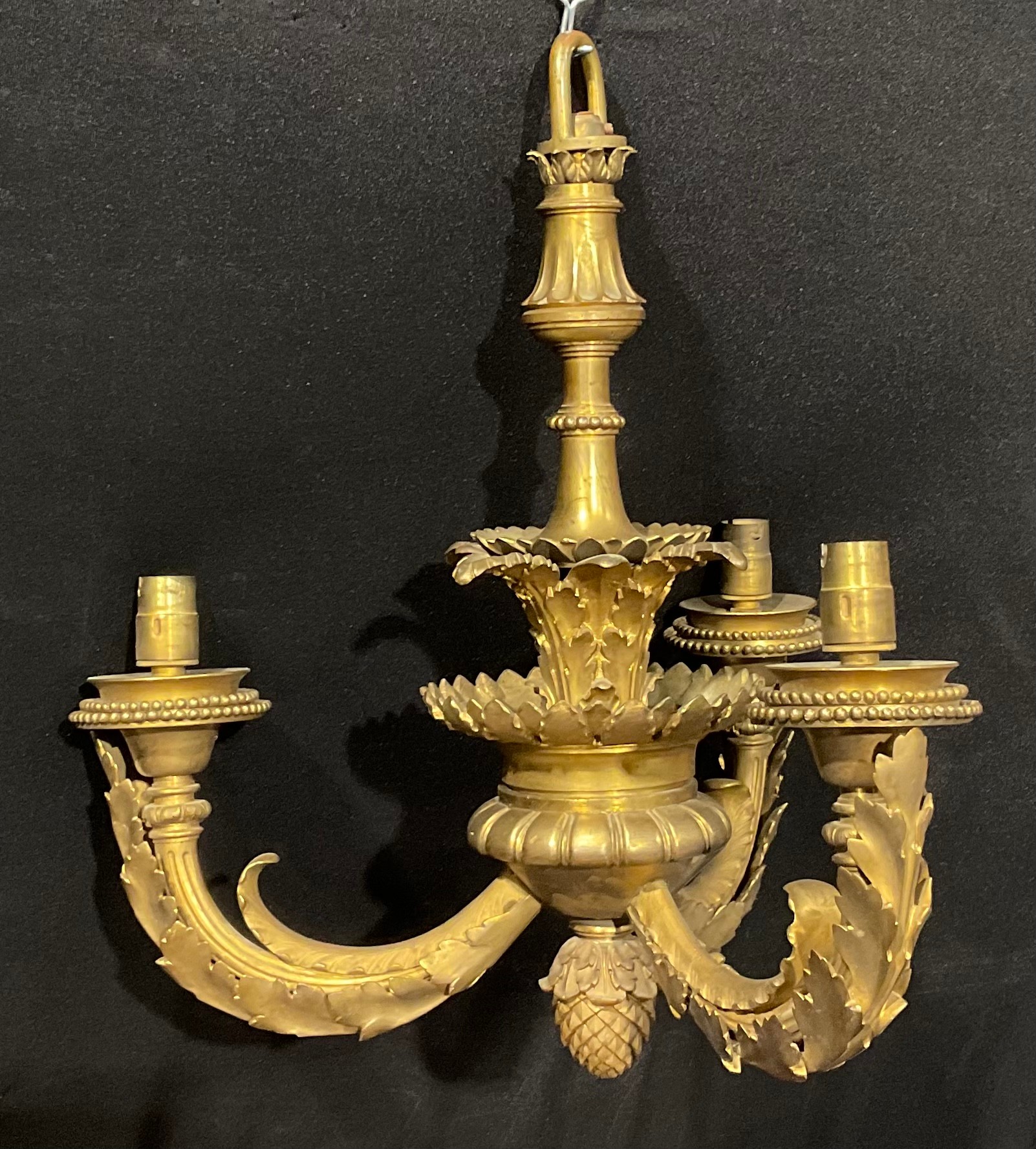 An early 20th century ormolu three branch electrolier, cast with acanthus, beaded borders, 37cm wide - Image 4 of 4