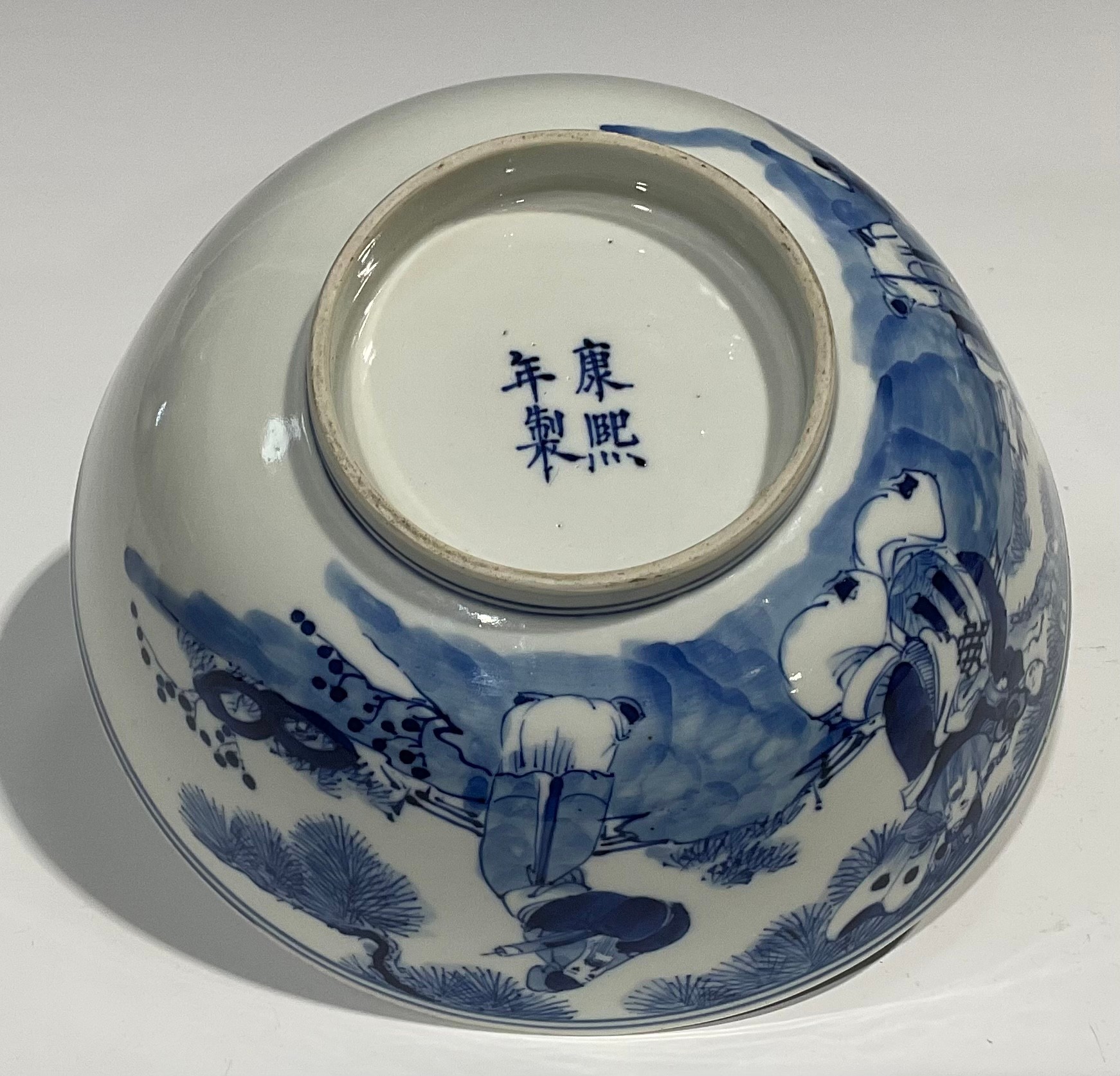 A Chinese circular bowl, playing in tones of underglaze blue with figures in a monumental landscape, - Image 7 of 8