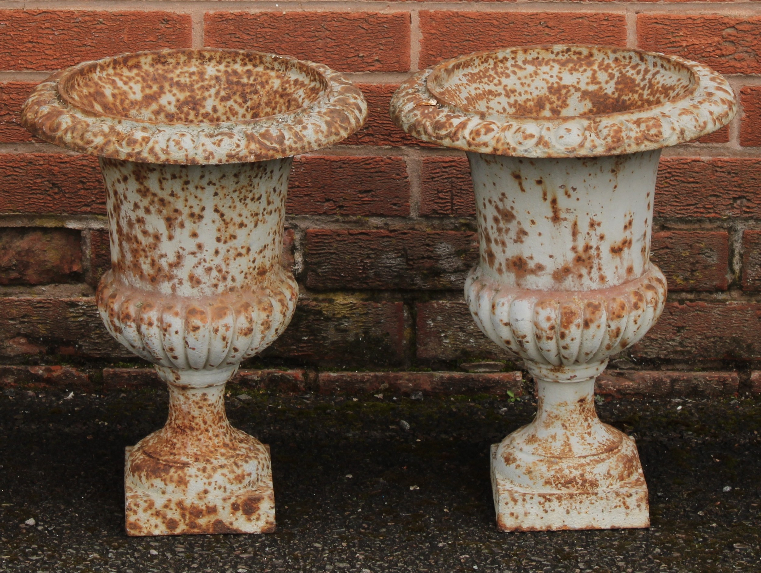 A pair of 19th century cast iron campana shaped garden urns, egg-and-dart rims, 43cm high, 33cm - Image 2 of 2