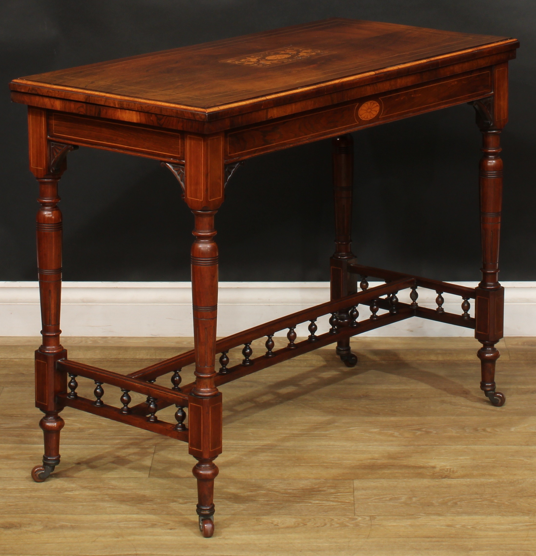 A late Victorian rosewood and marquetry card table, in the manner of Gillows of Lancaster and - Image 4 of 6