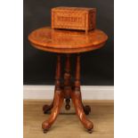 A Victorian walnut and marquetry centre table, of small proportions, oval tilting top, turned