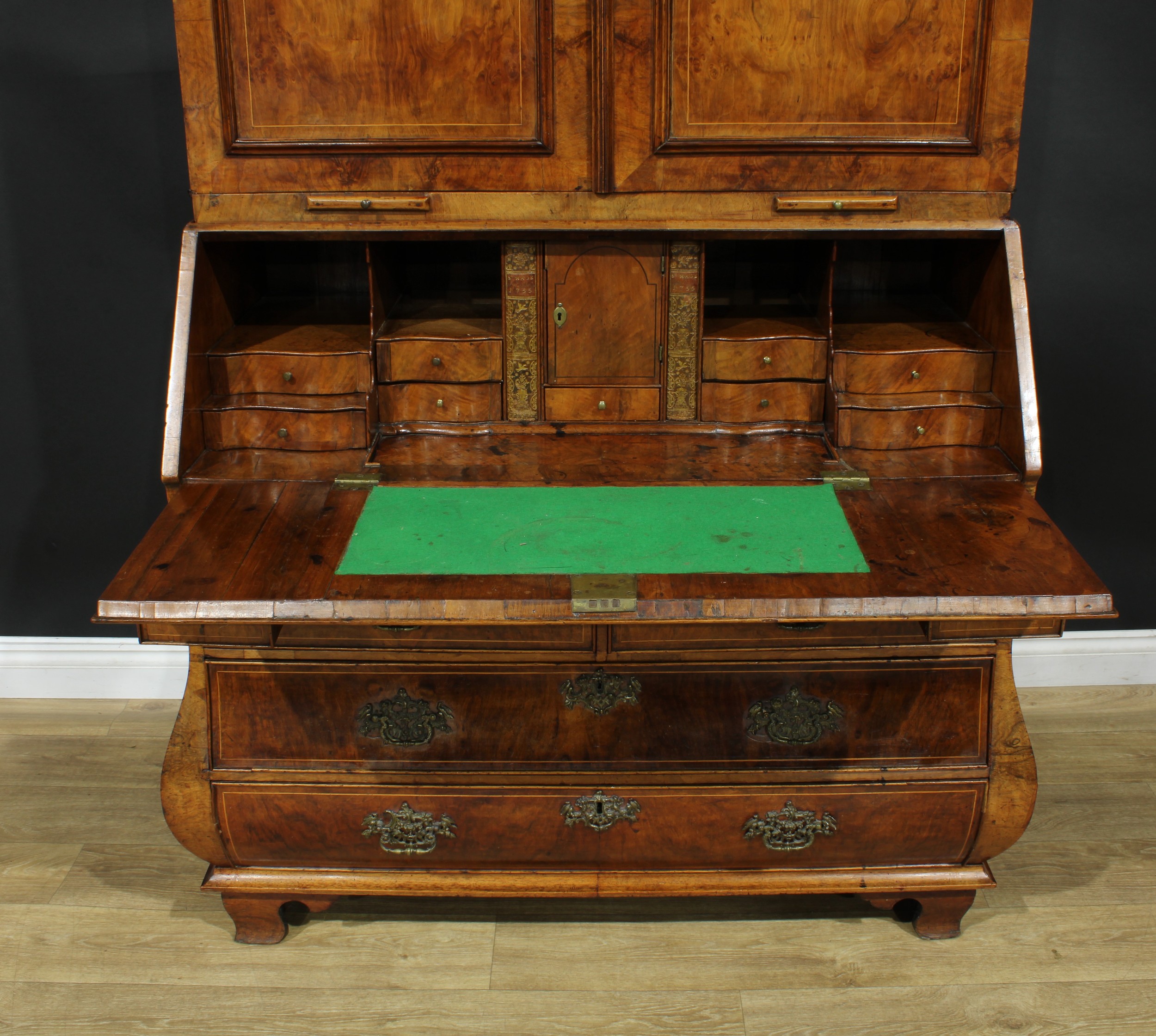 An 18th century Dutch walnut bureau book cabinet, the pair of panel doors above two candle slides - Image 4 of 9