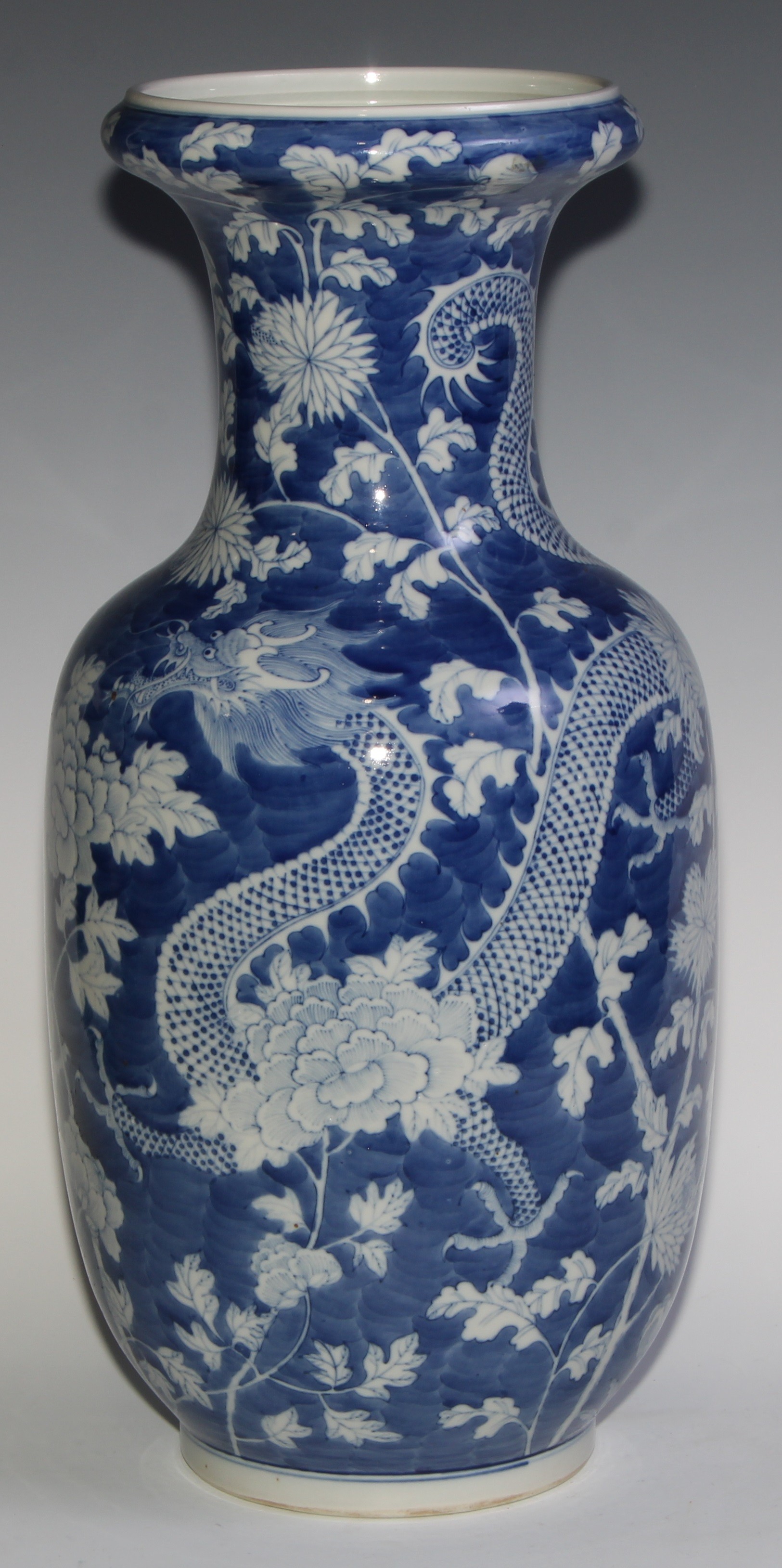 A large Chinese ovoid vase, painted in tones of underglaze blue with dragons amongst flowers and - Image 4 of 5