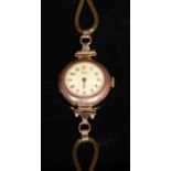 A lady's Rolex 9ct rose gold watch, white enamel dial, Arabic numerals, original brown leather
