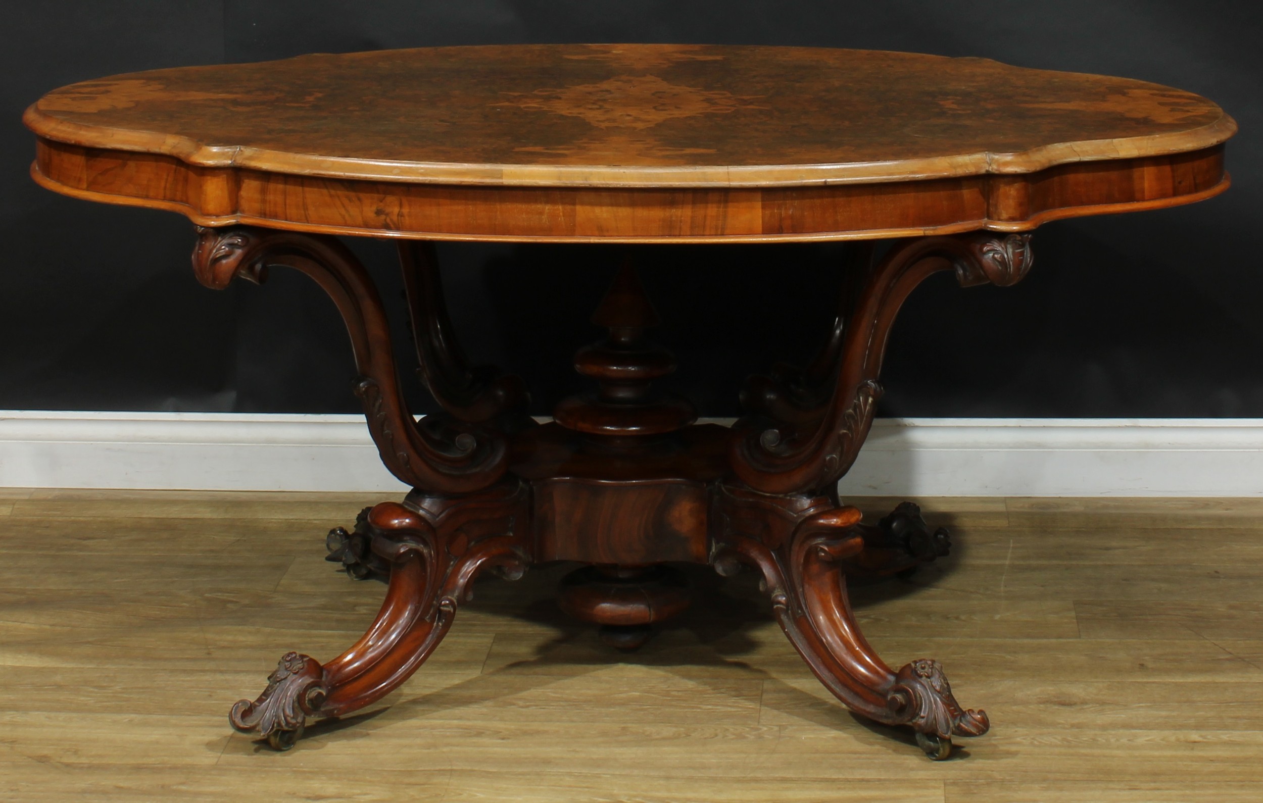 A Victorian walnut basket-base centre table, quarter-veneered burr top with moulded edge, S-scroll - Image 5 of 5