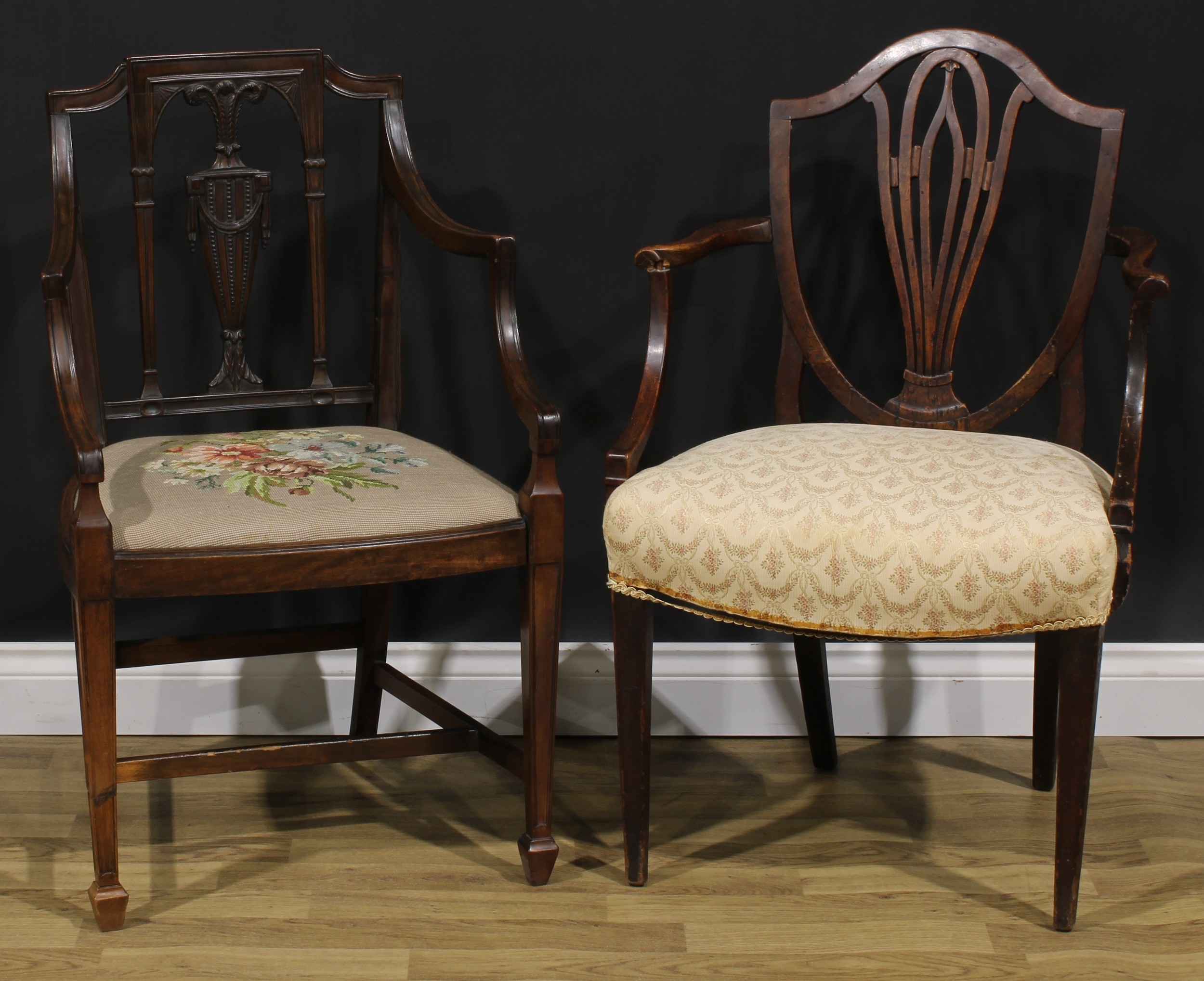 A George III mahogany Hepplewhite design elbow chair, 92.5cm high, 61cm wide, the seat 52.5cm wide