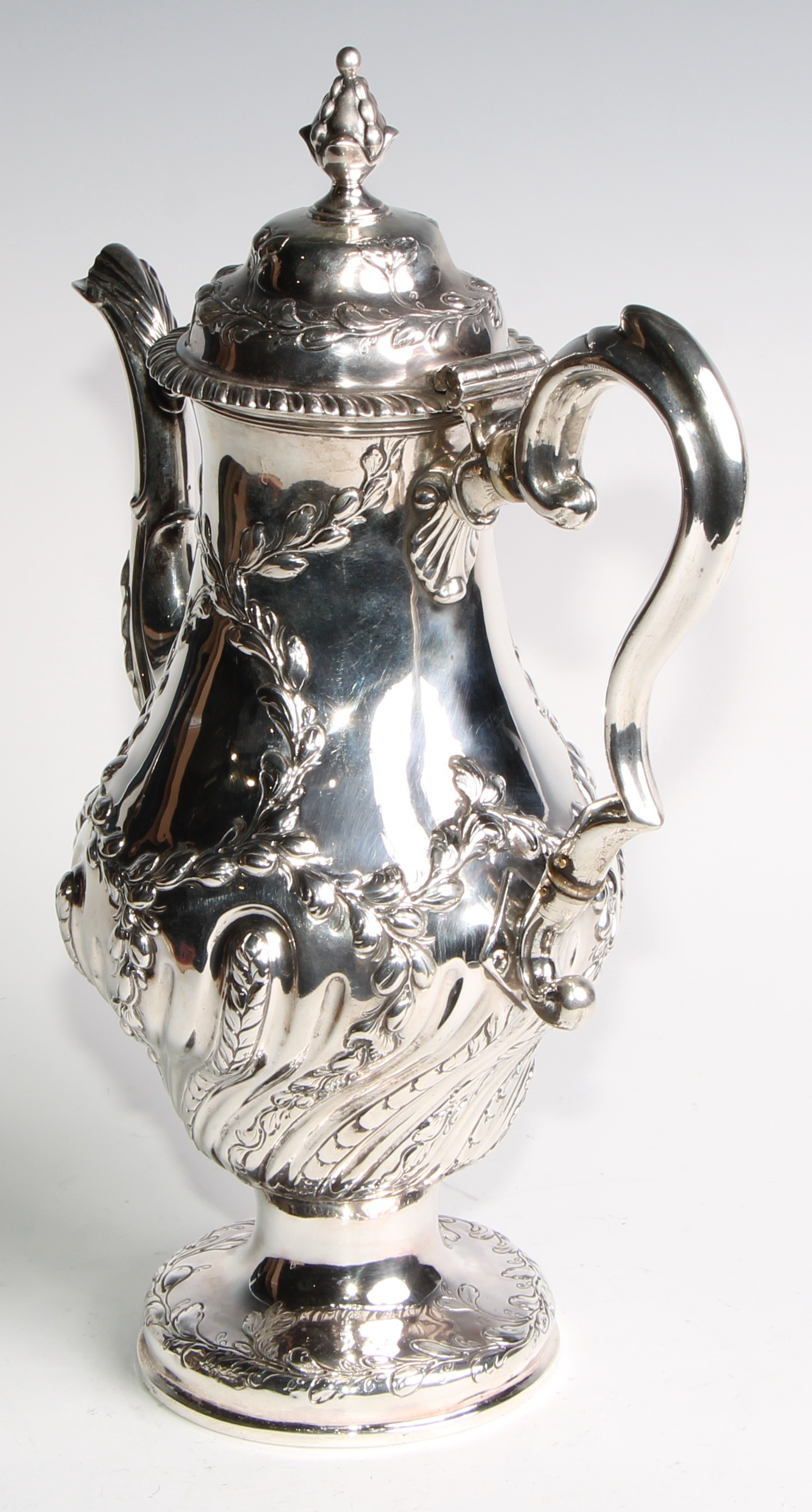 An early George III silver baluster coffee pot, wrythen half-fluted and chased with leafy - Image 5 of 6