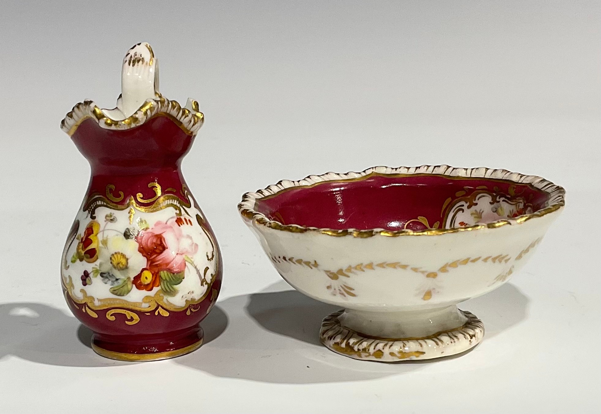 An English porcelain miniature jug and bowl, probably Rockingham, painted with flowers on a green - Image 12 of 12