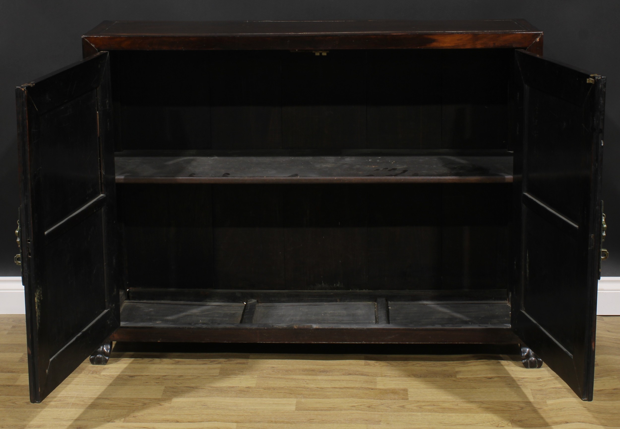 A Chinese hardwood side cabinet, rectangular top above a pair of panel doors carved and applied with - Image 3 of 6