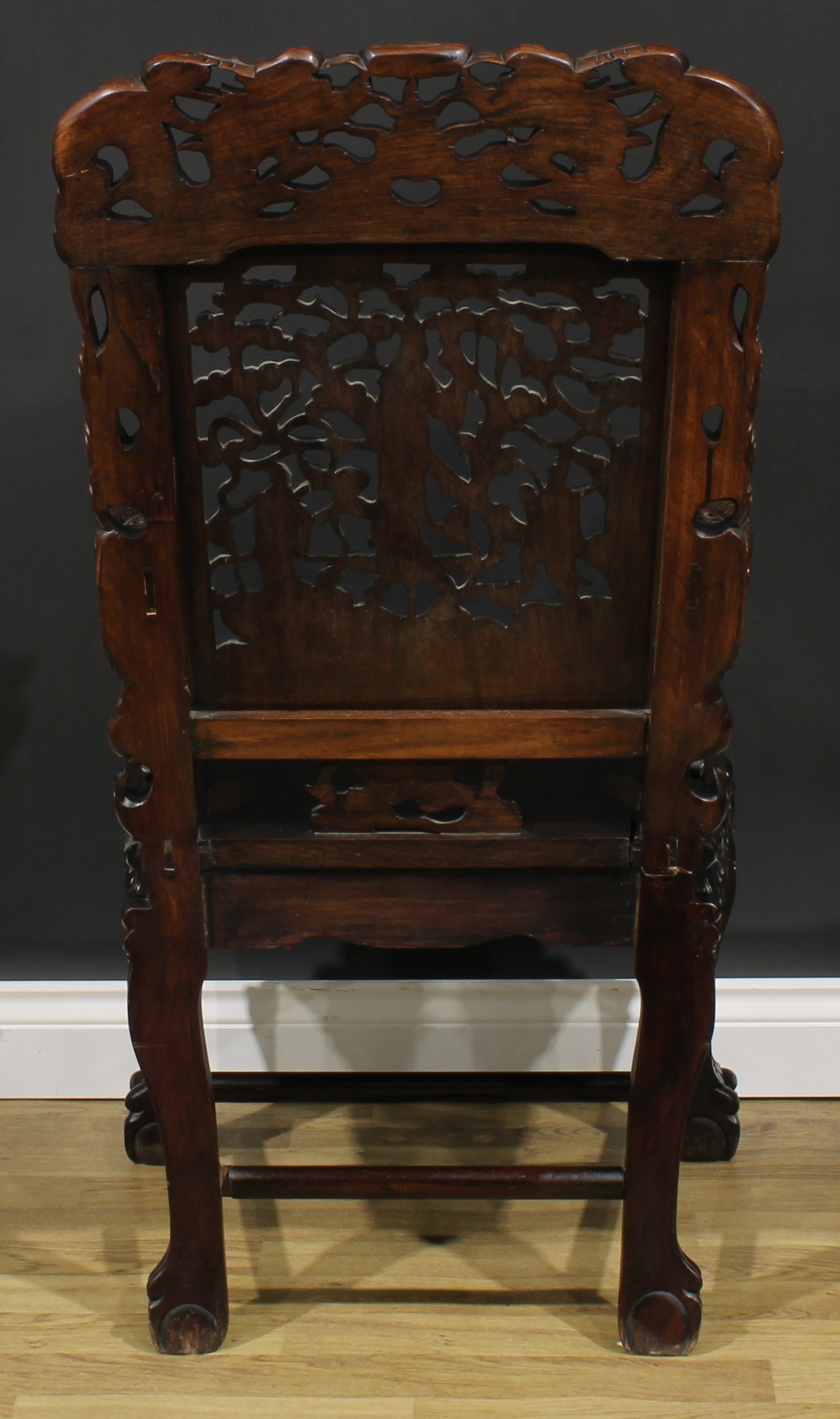 A Chinese hardwood armchair, shaped cresting rail pierced and carved with two dragons and a - Image 4 of 4