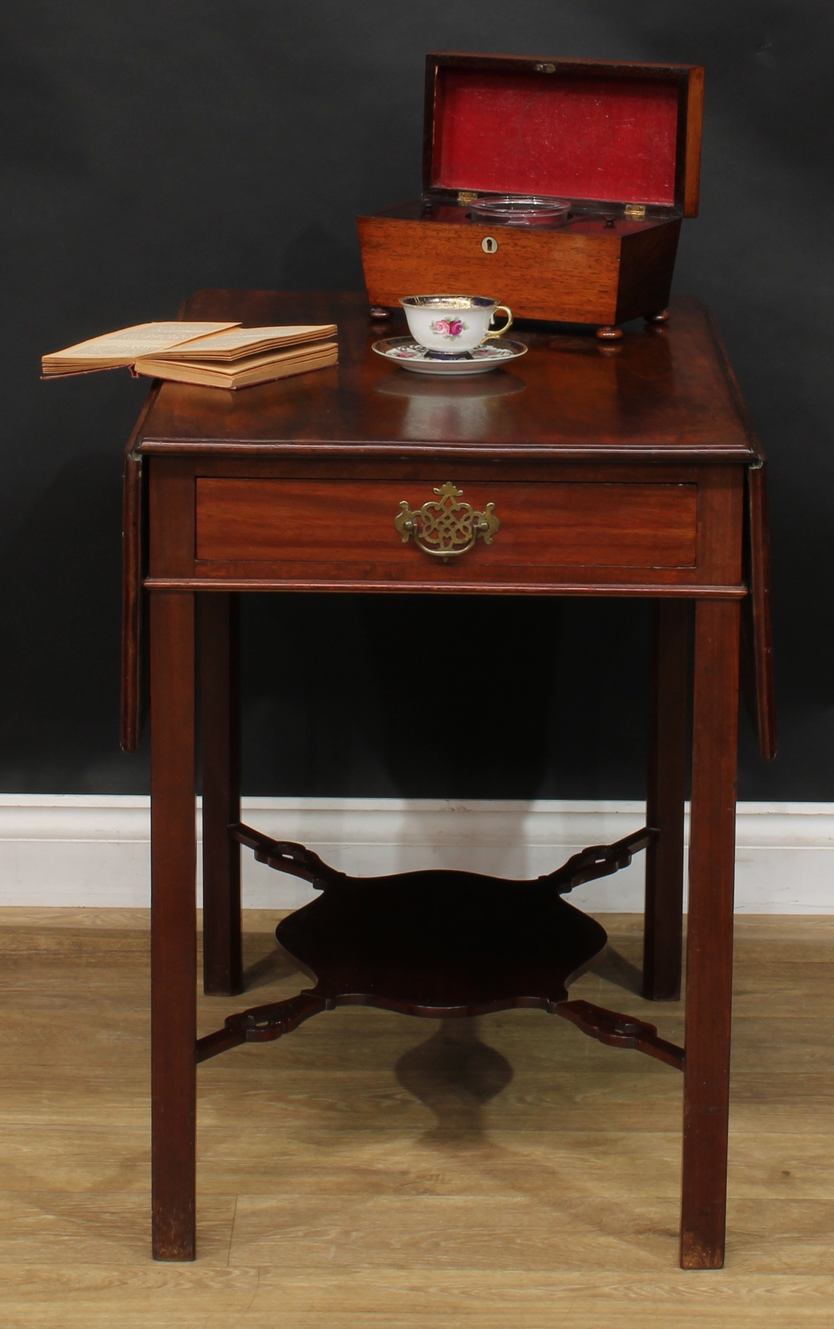 A 19th century mahogany Pembroke table, rectangular top with moulded edge and fall leaves above a
