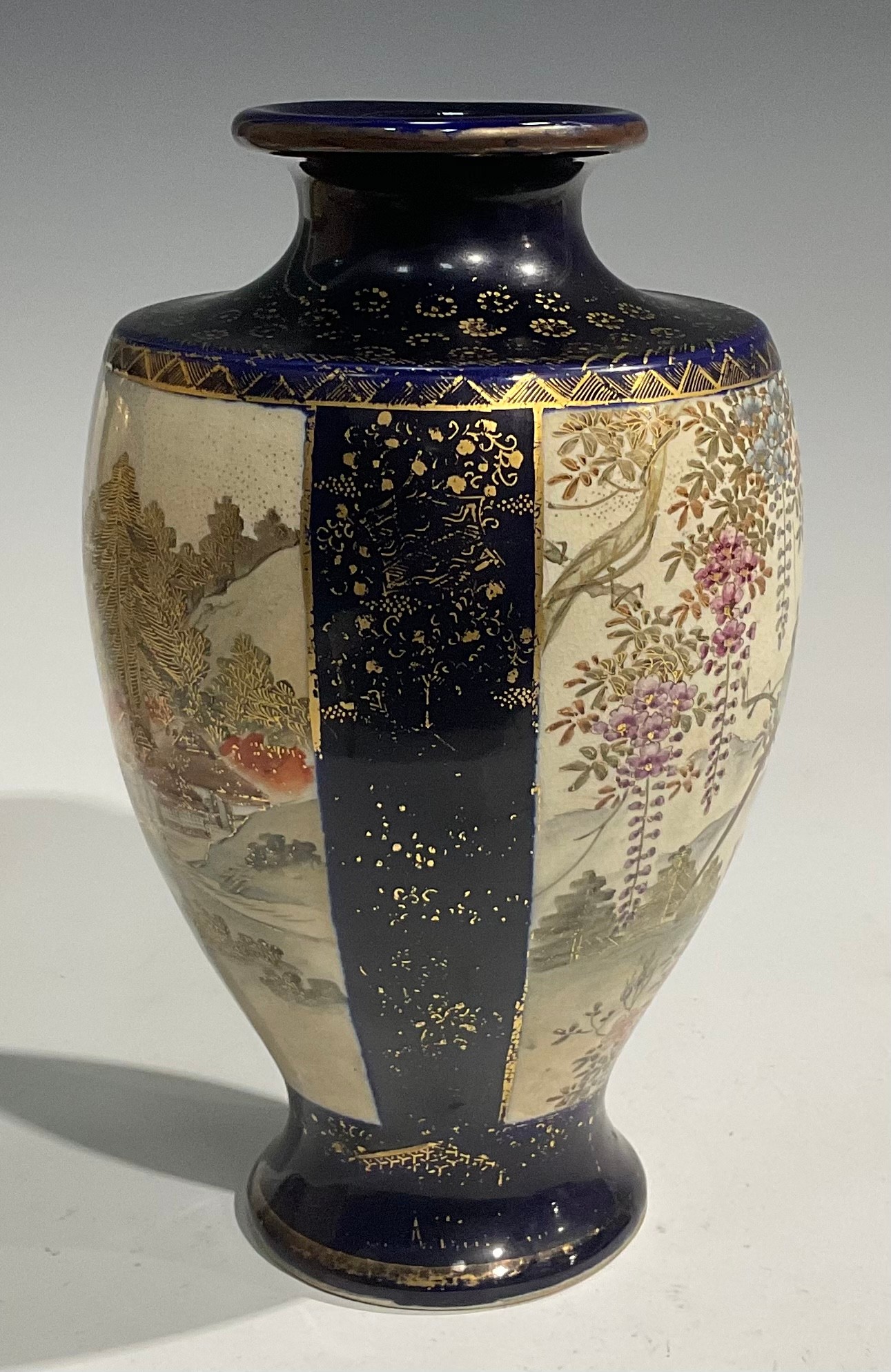 A pair of Japanese satsuma baluster vases, decorated with traditional landscape and bird panels, - Image 11 of 12