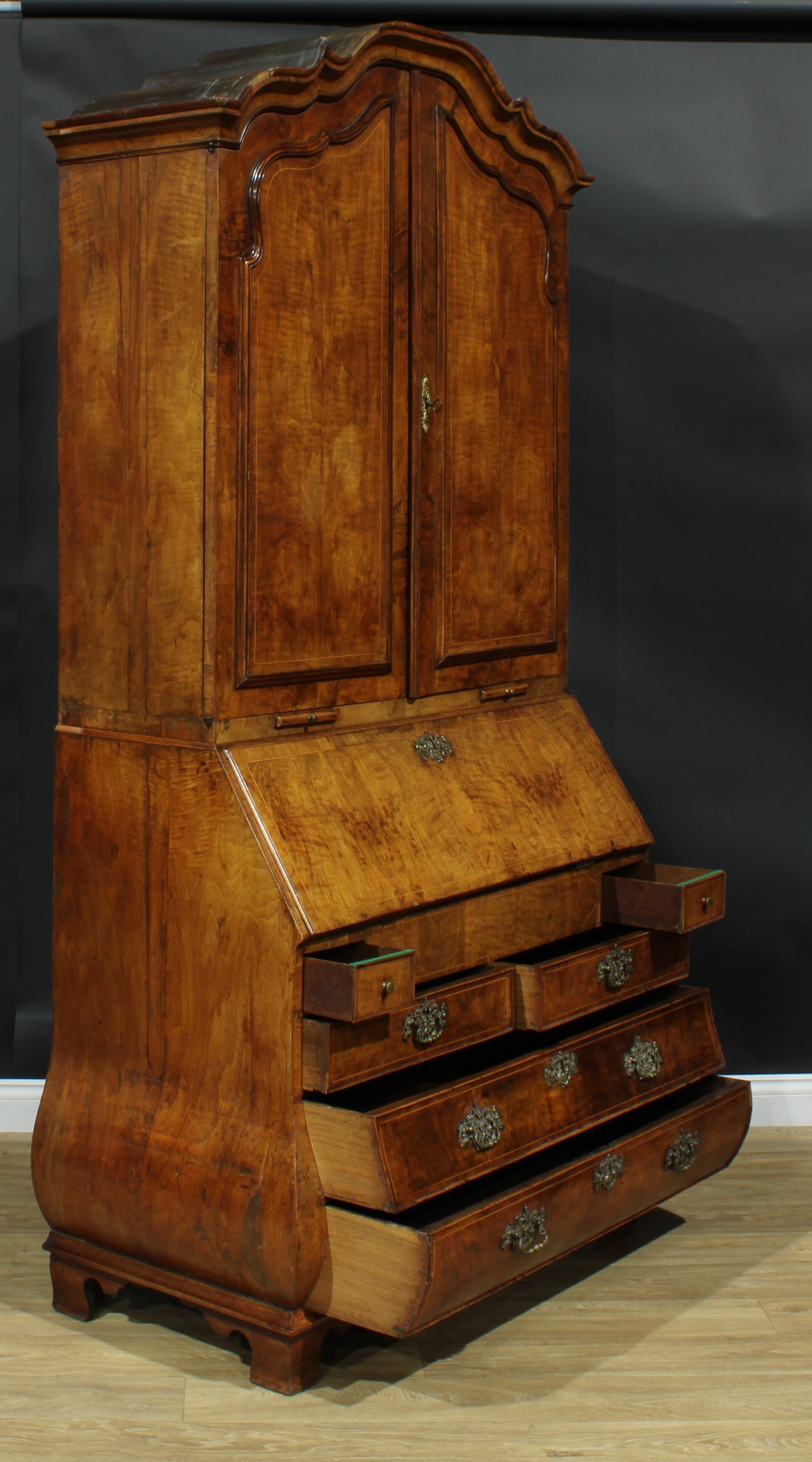 An 18th century Dutch walnut bureau book cabinet, the pair of panel doors above two candle slides - Image 7 of 9