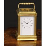 A 19th century gilt brass carriage clock, 6cm rectangular enamel dial inscribed Edward Bright,