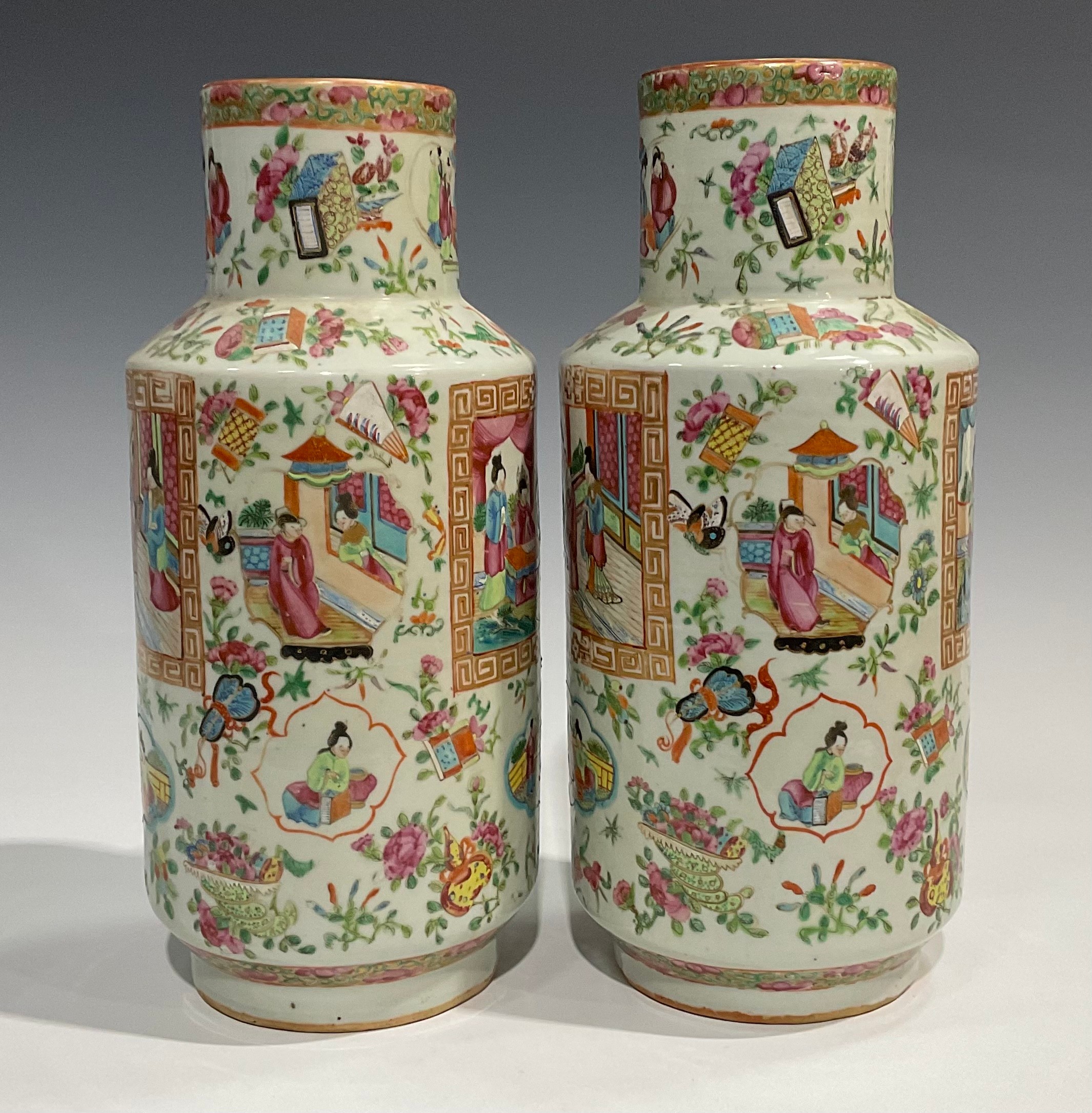 A pair of Cantonese Famille Rose cylindrical vases, decorated with alternating shaped panels of - Image 2 of 5