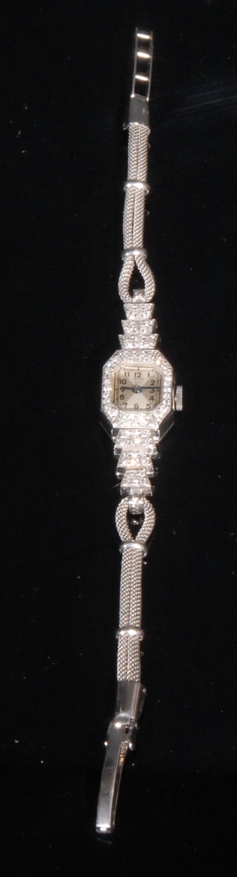 An Art Deco style ladies Bucherer diamond set platinum cocktail watch, silver dial, Arabic numerals,