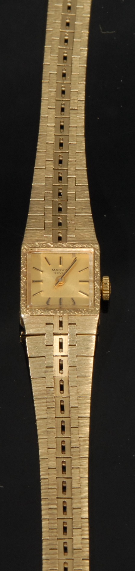 A 9ct gold Marvin Revue ladies wristwatch, square champagne dial, baton hour markers, articulated - Image 2 of 3