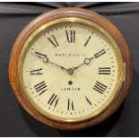A late Victorian/Edwardian oak railway or school wall timepiece, 25cm circular clock dial