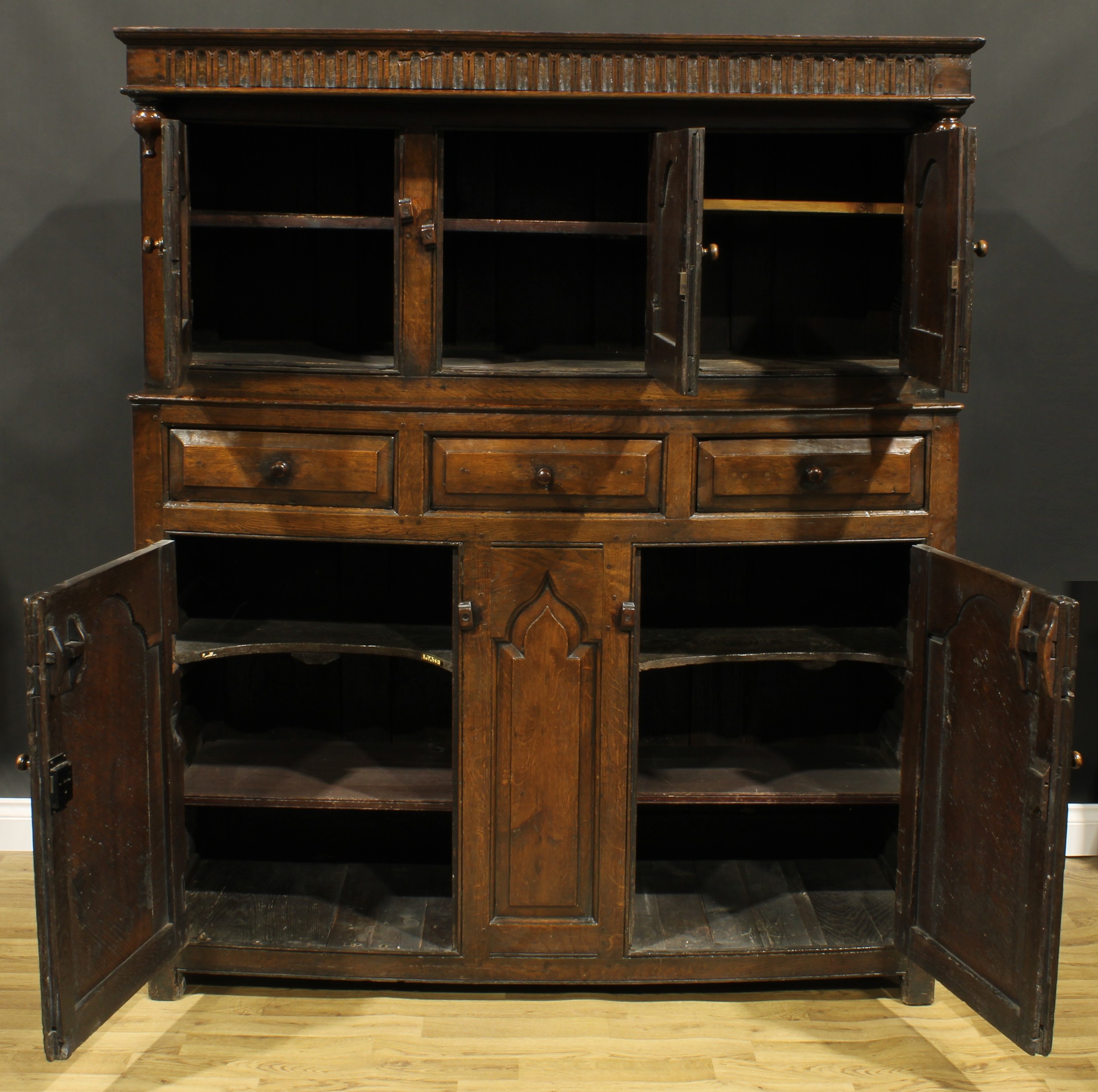 A 17th century style oak duodarn, rectangular top with nulled frieze above three raised and - Image 2 of 3