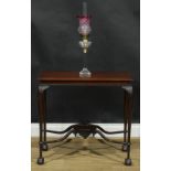 A Chippendale Revival mahogany occasional table, rectangular top, straightened cabriole legs