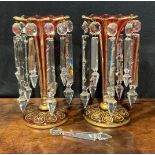 A pair of 19th century Bohemian ruby flashed and gilt table lustres, of trumpet form with shaped cut