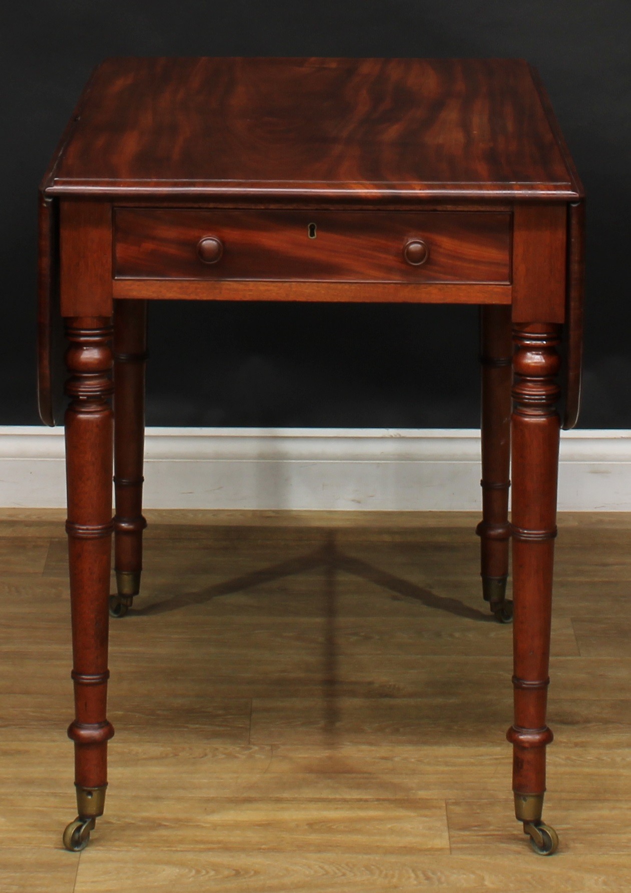 A George IV mahogany Pembroke table, rounded rectangular top with fall leaves above a single - Image 2 of 7