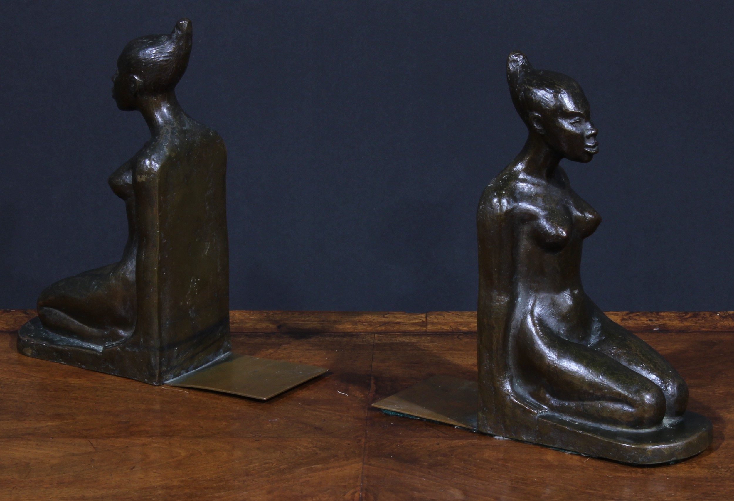 A pair of Art Deco brown patinated bronze bookends, probably Austrian, each cast as a kneeling - Image 2 of 4