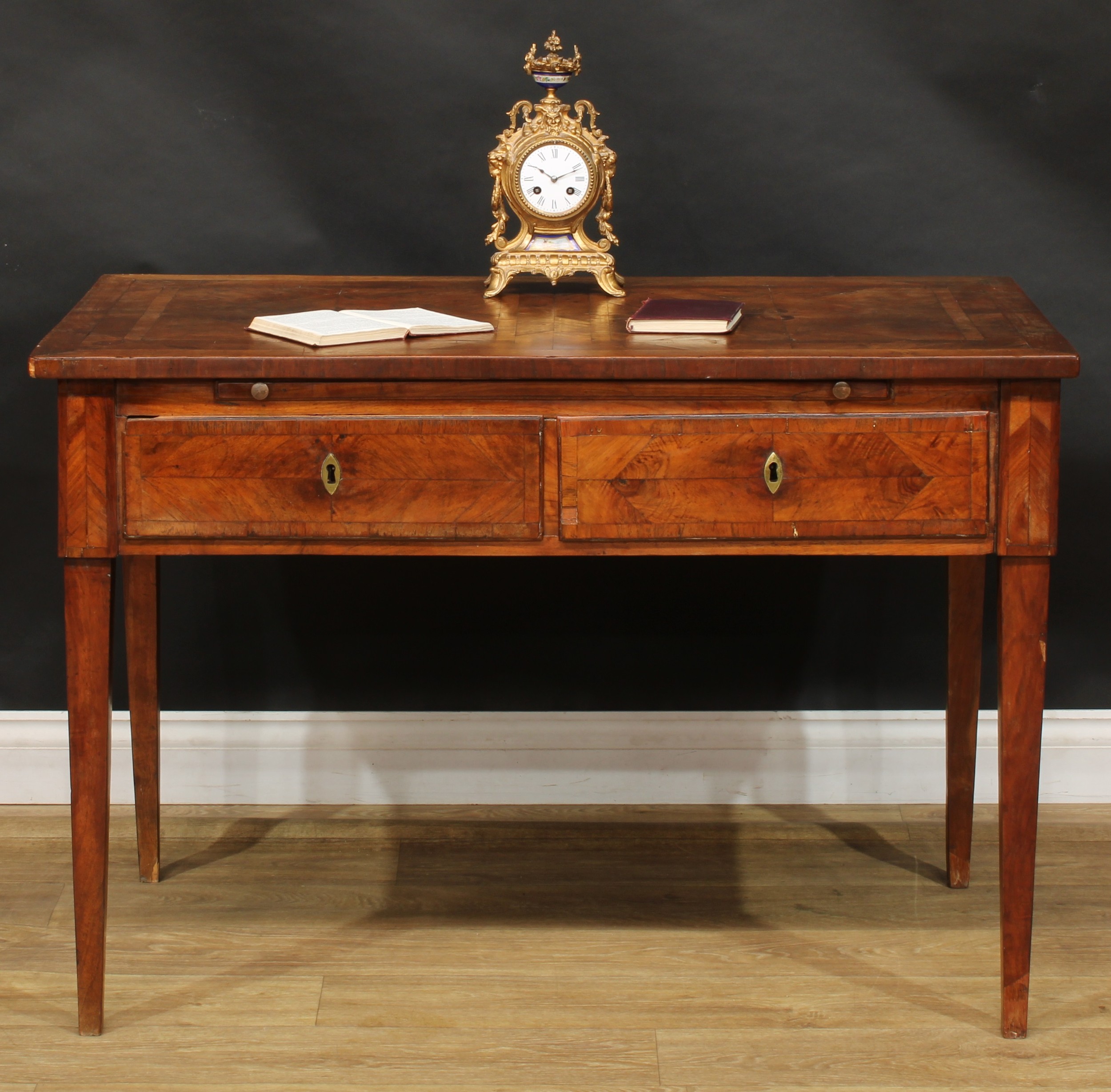 An 18th century French Provincial side table, rectangular top with geometric parquetry veneers,