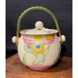 A Clarice Cliff Bizarre Pink Pearl pattern biscuit barrel and cover, hand painted with pink, yellow