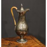 A George III Old Sheffield Plate baluster ewer, hinged domed cover with bud finial, beaded