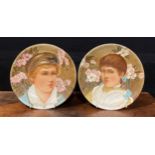 A pair of Aesthetic Movement circular plates, painted by Mary Salisbury, with portraits of a