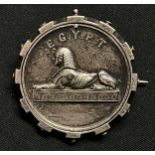 Victorian Egypt Campaign Medal which has been mounted into a circular cog wheel design frame and