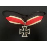Reproduction Knights Cross of the Iron Cross 1939 complete with ribbon and neck ties. Correct