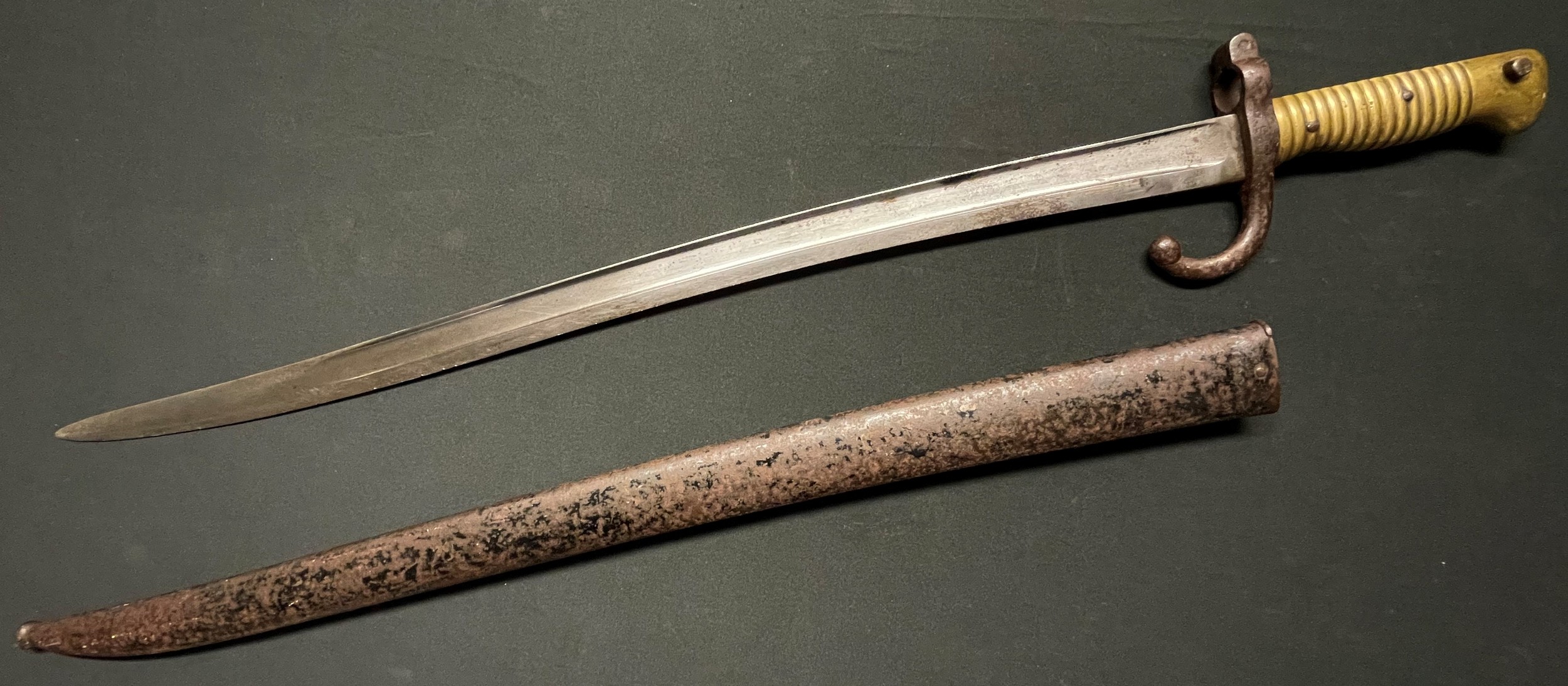 French 1866 Pattern Chassepot Bayonet with single edged fullered blade 574mm in length. Maker marked