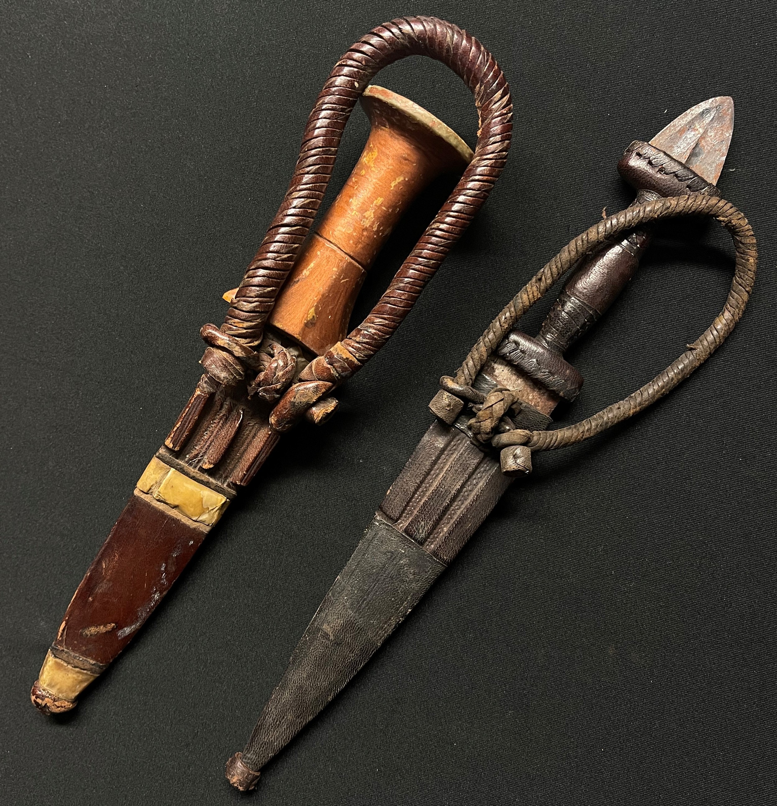 Two African Sleeve Daggers: one with gold painted wooden grip with 134mm long double edged blade, - Image 2 of 3