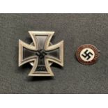 Reproduction WW2 Third Reich Iron Cross 1st class. One piece construction. Screwback with maker mark
