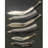 Three Kukri Knives all of the type brought home by British Servicemen as souvenirs. All with