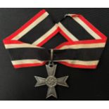 Reproduction Knights Cross of the War Merit Cross without Swords. Complete with ribbon . Marked "